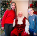 Santa Claus with a girl and boy. 