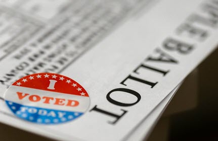 Sample Ballot with an I Voted sticker.