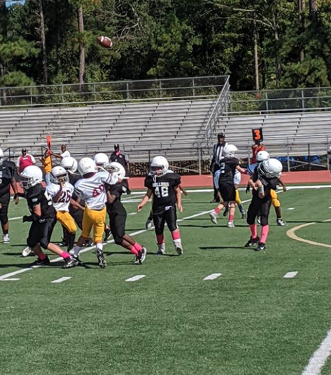 Youth Football Players Lining Up